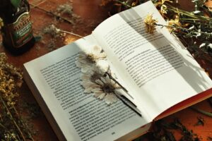 flowers pressed between pages of poetry book